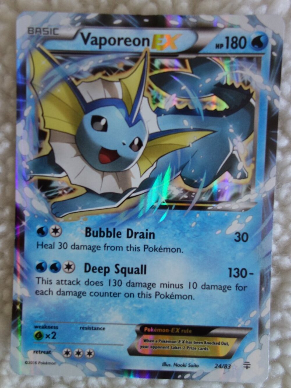 POKEMAN Vaporeon EX 24/83 Rare Halo Card
